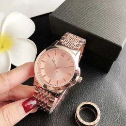 2024 Gu Fashion Nouvelle marque Montre-bracelet à quartz pour femmes fille avec bracelet en acier en métal Montres en gros Livraison gratuite Cadeau de créateur