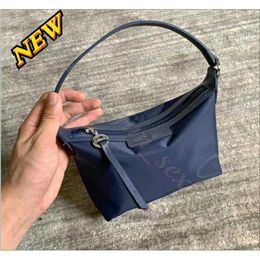 2024 Clai de sac à main venant 95% de réduction sur le portefeuille en gros de Lingyang Sac Femmes Fashion simple Bolsos Chain Sac Small Nylon Emperproof Handsbag Rtyu