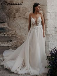 2024 Illusion Per perle Appliques en dentelle Robes de mariée en ligne A-Line Spaghetti Backles Bridal Bridal Robe de Mariee