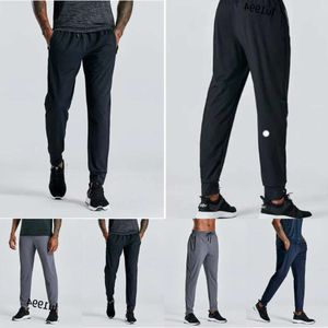 2024 Jogger lange broek Designer Mens Sport Yoga Outfit Outdoor City Sweat Yogo Gym Pockets ll Heatpants broek Heren Casual Elastische Taille Fiess Lu