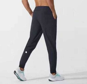 2024 leggings uitlijnen Mannen Broek Yoga Outfit Sport Sneldrogend Trekkoord Gym Zakken Joggingbroek Broeken Heren Casual Elastische Taille designer lululemens 1009ESS