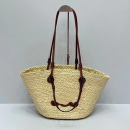 2024 Édition limitée Sac de marque de mode d'été Sac de paille Sac de grande capacité Sac tissé en fibre végétale Sac de légumes mignon et pratique Sac momie Sac seau Sac de plage