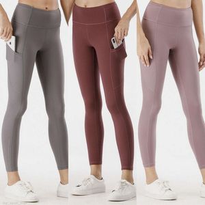 2024 Lu Align Lu Mujeres Pantalones de yoga Pantalones deportivos Pantalones deportivos Pantalones de chándal Leggings desnudos Bolsillos de talle medio Pantalones de yoga Chica Ejercicio Levantamiento de glúteos Wunder Train Fashi