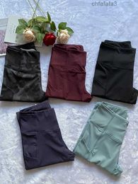 2024 Lu Lemen Mujeres Dos bolsillos Biología recortada Pantalones de yoga Fitness Leggings Medias Cintura alta Correr Capris Entrenamiento Gimnasio Ropa deportiva Ropa deportiva X4VD