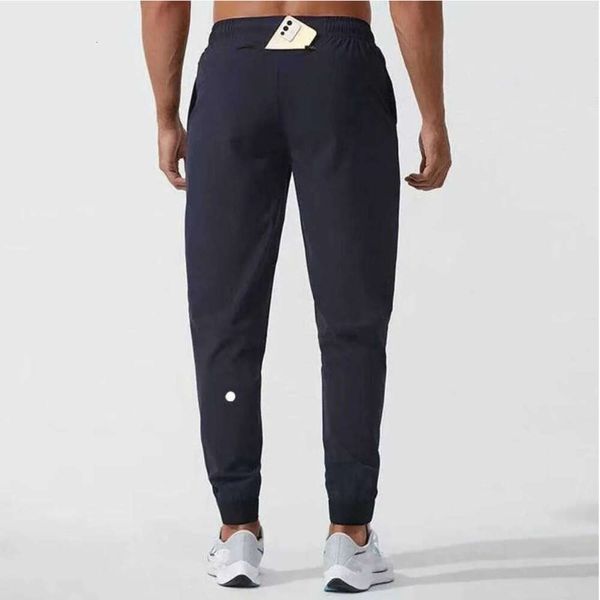 2024 LULULEMENI Jogger Men's Long Pants Sport Yoga Conjunto de yoga Drak Drawstring Gym Psockets Pantalones de chorro para hombres Casual elástica Fiess VHF668