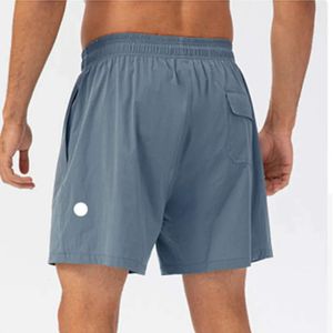 2024 Lululemeni Men Yoga Sports Short court short sec avec Pocket Back Phone Mobile Running Running Gym Jogger Pant JK668