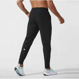 2024 lululemenI Femmes Pantalons Courts Yoga Outfit Jogger Sport Séchage Rapide Cordon De Gym Poches Pantalons De Survêtement Pantalon Décontracté Taille Élastique Fiess Homme 66ll