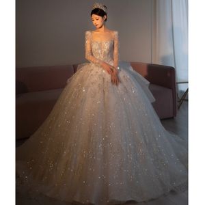 2024 Luxe trouwjurken Arabische kristallen pailletten Ball Gunge Sheer Long Mouwen Bling Sparkly Dubai Garden Bridal Jurken Court Train Sexy Back Vestido de Novia