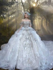 2024 Robes de bal de bal de luxe robes de mariée princesse corset chérie organza rouffes train cathédrale