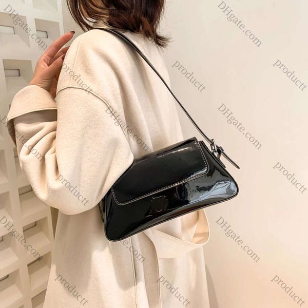 2024 Bolsos de diseño de lujo para mujer Bolsa de axila láser Bolsa de hombro plateado plateado bolso de bolso de mango de mango superior femenino 10a 10a