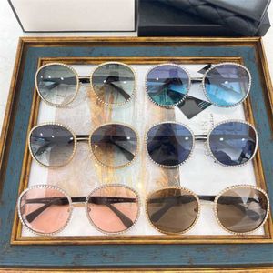 2024 Luxe designer Men's Luxe Designer Dames Zonnebril Small Perfum Diamond frame Ronde Ronde klassieke mode veelzijdige vrouw