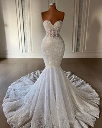2024 Robes de mariée de luxe sirène robes de mariée chérie illusion pleine dentelle appliques perles de cristal plus la taille africaine queue de poisson nigériane