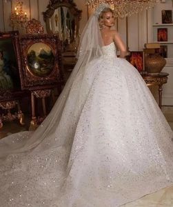 2024 Luxury Puffy Robe de mariée africaine Sheer Cou Sleets courts Crystal Beads Appliquée en dentelle Femmes Bridal Bridal Court Train Vestido de Novia