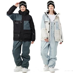 2024 man Vrouw Sneeuw Draag waterdichte skischak Set snowboard kleding buiten kostuums winterjassen en slabbetjes broek 240111