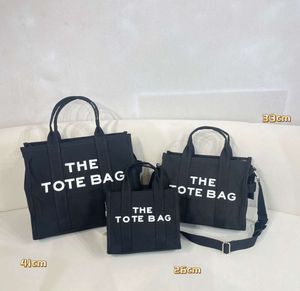 2024 Marc Totes Designer Handbag Femmes Le sac fourre-tout sac à main Faire Fashion All-Match Shopper épaule 3 taille 26 33or41cm 66ess