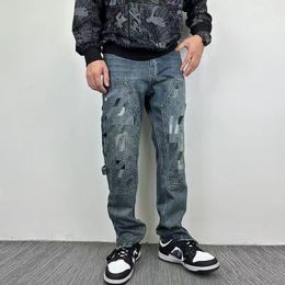 2024 Heren jeans ontwerper retro hiphop luxemerk grafische streetwear denim los rechte motorrijder casual lange mannen gescheurde jeans