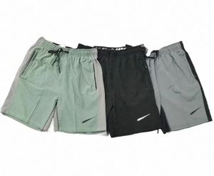 2024 Hombres Pantalones cortos Verano Gimnasio Fitness Culturismo Correr Masculino Pantalón corto Longitud de la rodilla Malla transpirable Ropa deportiva Pantalones de playa 31jN #