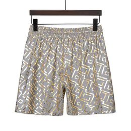 2024 Mentiers designers shorts d'été Men Pantalon de plage décontracté créateur de sports courts mode rapide séchage noir et blanc taille asiatique Qaq