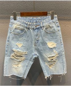 Short en jean déchiré pour hommes, bleu clair, cinquième pantalon, tendance, ample, en laine, couture fendue, 2024