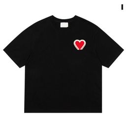 2024 camisetas para hombres diseñador de manga corta para mujeres de moda de verano marea suelta tide de alta calidad algodón heart estampado de lujo tops ropa 22 colores