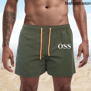 2024 Heren Dames Designer Shorts Summer Brand Fashion Loose Streetwears Clothing Snel drogen Swimwear Printing Board Beach Pants Man Swim Short
