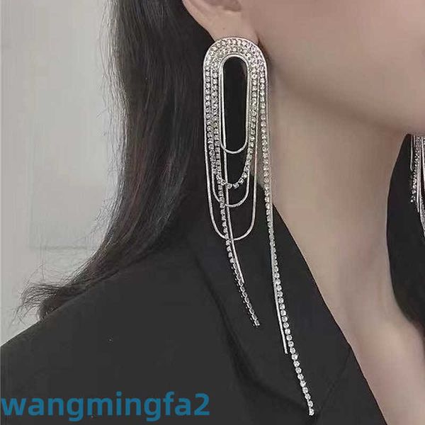 Pendientes de cadena de Metal con personalidad súper brillante, borla larga de diamantes, estilo Jinxi, diseñador de joyería New Age, 2024