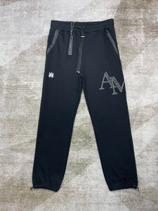 2024 Nouveau créateur pour hommes de couleur belle belle lettre pantalon de jogging ~ pantalon de taille US ~ tops mens yoga joggers pantalon de survêtement