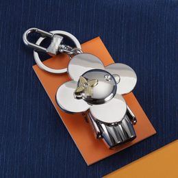 Porte-clés de voiture de styliste en métal, tournesol exquis, pour hommes et femmes, pour sac, nouvelle collection 2024