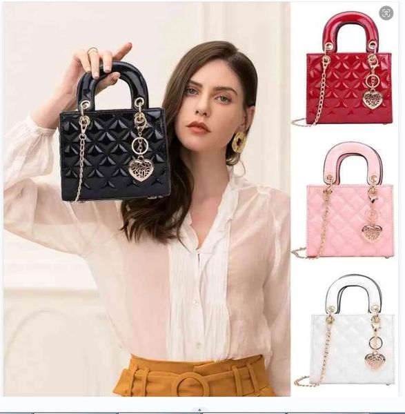 2024 NUEVOS bolsos de noche de cuerpo cruzado bolsas de lujo para mujeres bolsas de gelatina a cuadros Flap colgada de color mini diseñado de la cadena de hombro de los hombros del bolso de la carnera de mensajería