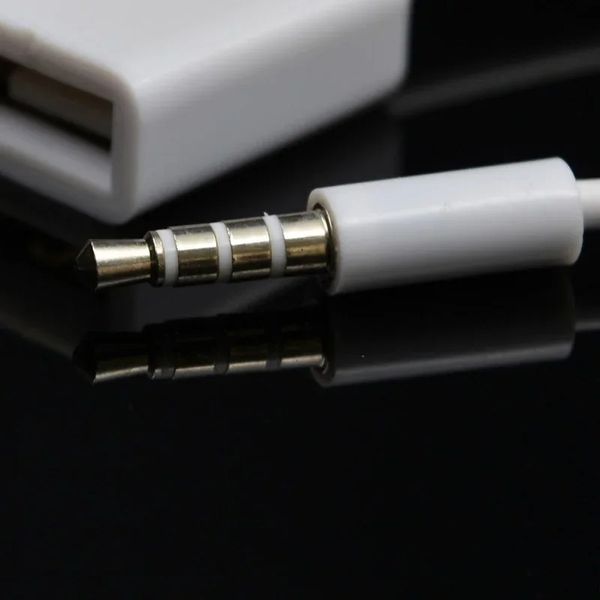 2024 Nouveau câble de données 3,5 mm mâle à USB Câble de conversion féminin Aux voiture MP3 Adaptateur audio Câble U Clip de disque Ligne 15 mm Longueur White pour USB