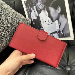 2024 nouveau sac de téléphone portable long à motifs de litchi en cuir véritable avec cordon de serrage et poignée pour porte-monnaie pour femmes porte-monnaie portefeuille