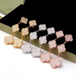 2024 NUEVO LUXURY Full Diamond Clover Brand Classic Long Crystal Aring Fashion S925 Diseñador de pendientes de plata para mujeres