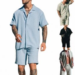 2024 Nuevos hombres Conjunto de dos piezas de manga corta Camisas a tope de solapa y pantalones cortos Trajes de playa Hombres Ropa de verano Ropa de calle Chándal 69ps #