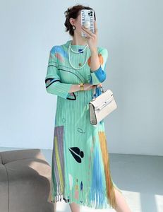 Jupe plissée élégante à pompons, haut de gamme, nouvelle collection 2024