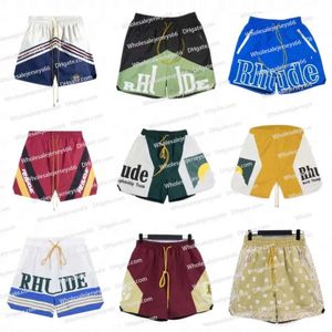 2024 Nuevos pantalones cortos de baloncesto rhude para hombres Pantalones cortos de carreras Sports Fi Shorts de verano Versátil Versátil Mesh transpirable Mesh