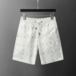 2024 NUEVOS Pantalones cortos de verano para hombres Pantalones cortos de diseñador Verano para hombre Traje de baño para mujer Playa Corta de lujo Marca francesa Etiqueta bordada Secado rápido Deportes