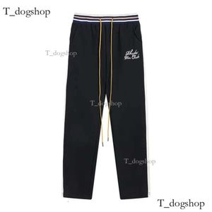 2024 New Tide Brand Rhude Men's Letter Broidery Hip Hop Sweatpants Hommes et femmes Pantalon d'entraînement lâche décontracté Joggers Trous 824