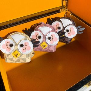 2024 Nueva moda Owl Zero Wallet Bluetooth Auricular Bolsa Bolsa para llaves Boca Sobre rojo Fábrica al por mayor en stock