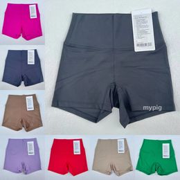 2024 Nuevos pantalones cortos de yoga para mujer en varios colores pantalones cortos de tallas de yoga transpirable para secado rápido y pantalones deportivos