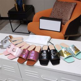 2024 Nieuwste TOP Kwaliteit platte Slippers Sandalen blingbling vrouwen beroemde merk Designer Echt Leer Mode metalen gesp Sandalen party schoenen jurk schoenen grote maat