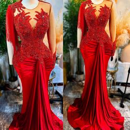 2024 Plus Size Red Prom -jurken voor zwarte vrouwen belspelen een schouder met een schouder lange mouwen illusie zeemeermin Tassel Appliqued kralen Lace Verjaardagsfeestjurken Jurken AM704