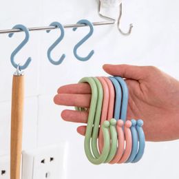 2024 draagbare multifunctionele keukenhaken duurzame huisorganisator s vorm plastic kledingrek baby kinderwagenhanger voor multifunctionele hanger