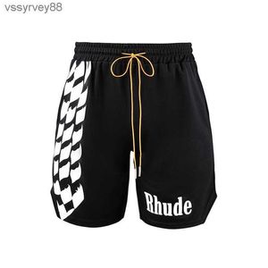 2024 Rhude Shorts Designer Mode Rhude Noir et Blanc Shorts en damier Hommes Femmes Loisirs High Street Cordon Mesh Basketball Training Shorts GKT4