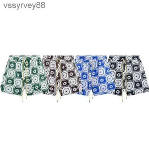 2024 Rhude Shorts Designer Nouveau Plein Imprimer Fleur De Cajou Rhude En Ligne Argent Pantalon De Plage High Street Style Unisexe Shorts NHWG