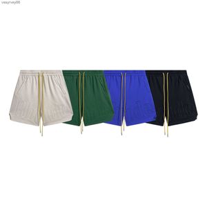 2024 Rhude Shorts Designer Printemps / Été Nouveau Rhude Lettre Broderie Hommes et Femmes Sports Casual Séchage Rapide 5/4 Shorts CO87