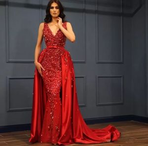 2024 Vestidos de noche atractivos Use cuello en V Rojo Sin mangas Sirena Lentejuelas de encaje Cuentas de cristal Vestido de fiesta Overskirts Fiesta Pageant Vestidos formales Tren desmontable