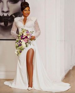 2024 Vestidos de novia sexy de sirena de sirena Africana Apliques de encaje de cuello de las perlas laterales Ilusión de mangas largas Vestidos de Novia Bodas de novia