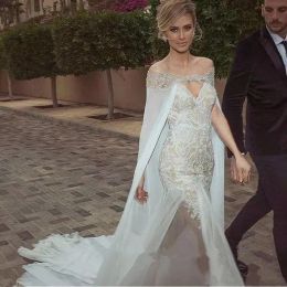 2024 Robes de mariée sexy sans manches dentelle de dentelle Edge Growns Bolero Veste châle Robe de mariée sirène faite sur mesure avec enveloppe