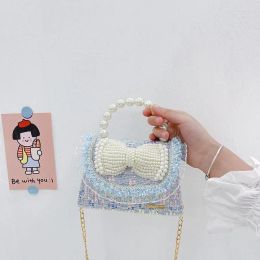 2024 bolsas de compras Bolsas para niños Accesorios de arco de perla Versión coreana Mini Chain Chain Cambio de hombro Crossbody