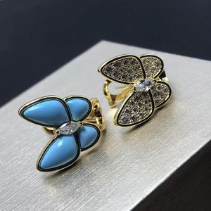 2024 Zilveren bedel geslepen oorbellen diamant en turquoise vlindervormig met doos turquoise Klaver oorclip van hoge kwaliteit Blauwe strik dasymmetrische oorbellen